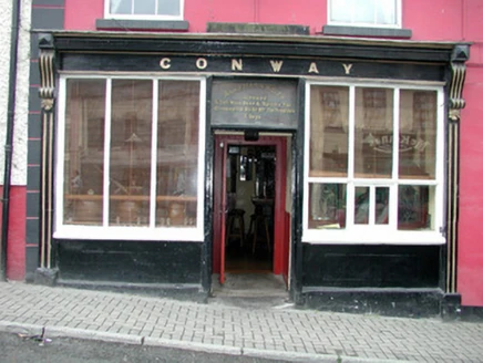 Conway's original timber shopfront with raised CONWAY lettering and dark woodwork